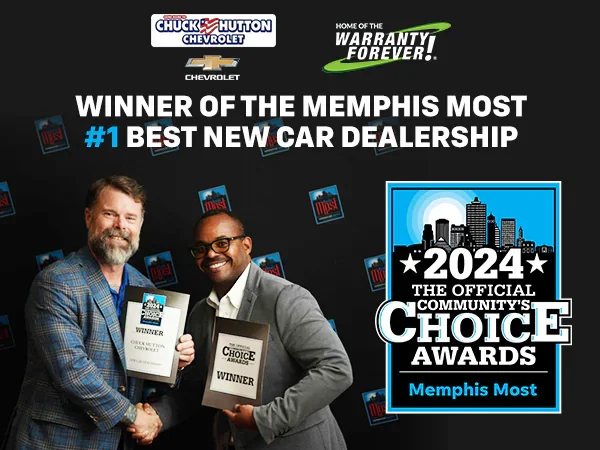 A two peoples with award on banner